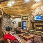 Mountain Melody great room with fireplace and built in pet kennel