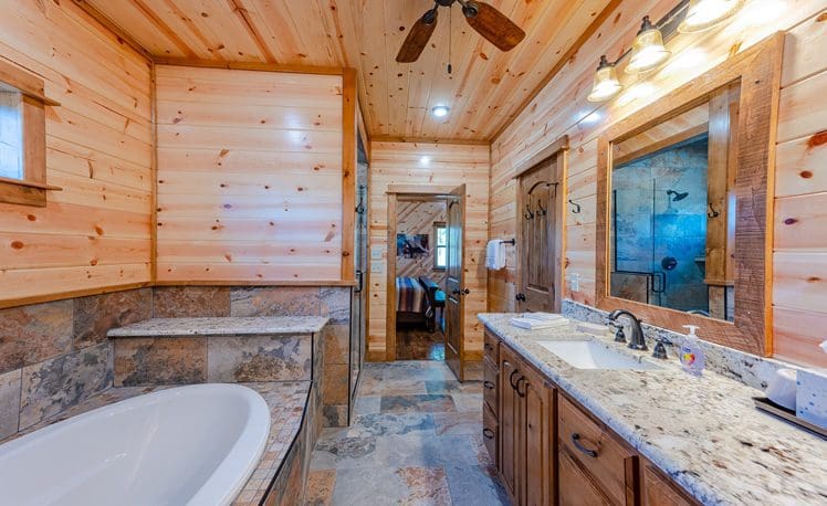 Song Bird Cabin Master Bedroom Bathroom with double vanity