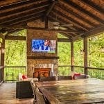 Outdoor TV and dining area