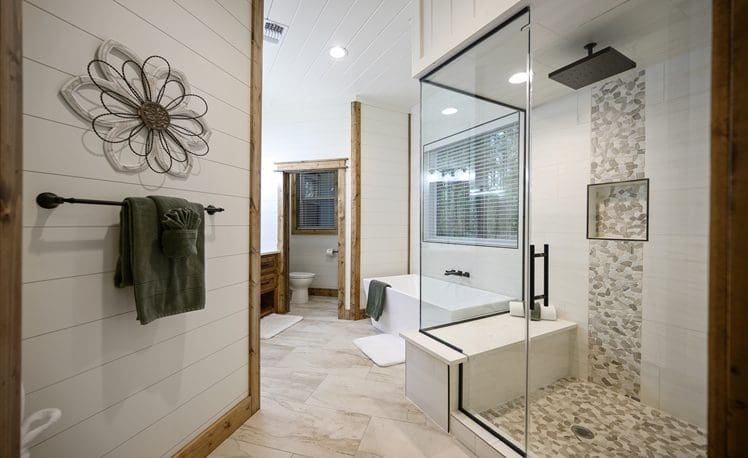 Large walk in shower with steam and soaking tub