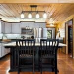 Kitchen with cooking island and seating