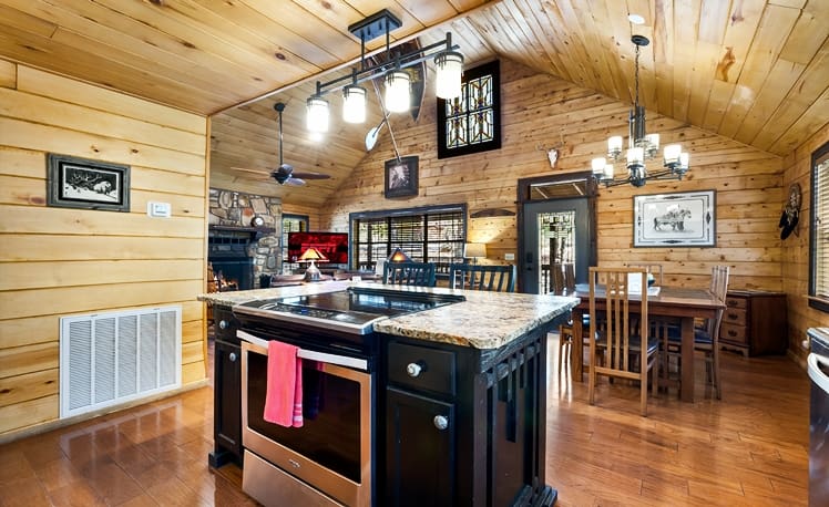 Kitchen with cooking island and seating