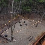 outdoor firepit with string lights