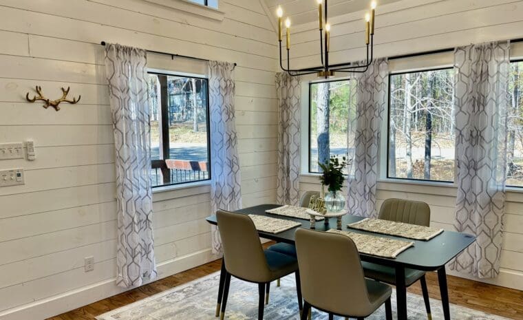Dining Table with Chandelier and Windows