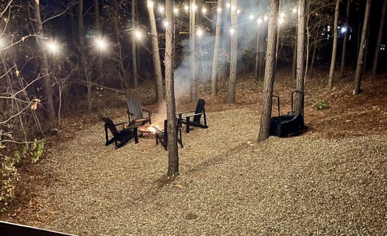 Fire Pit with Adirondak Chairs and String Lights