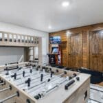 Bunk room with Foosball table
