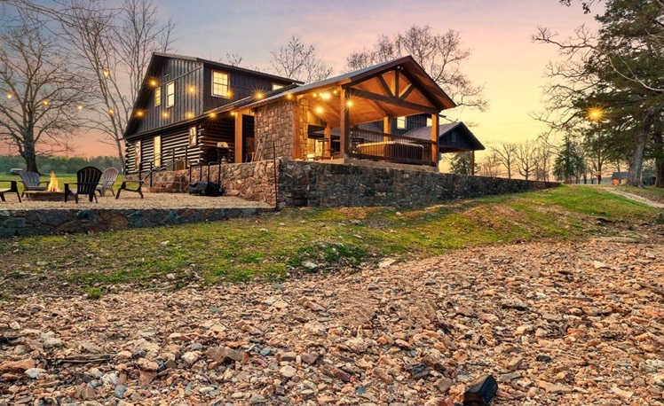 view of cabin across a creek