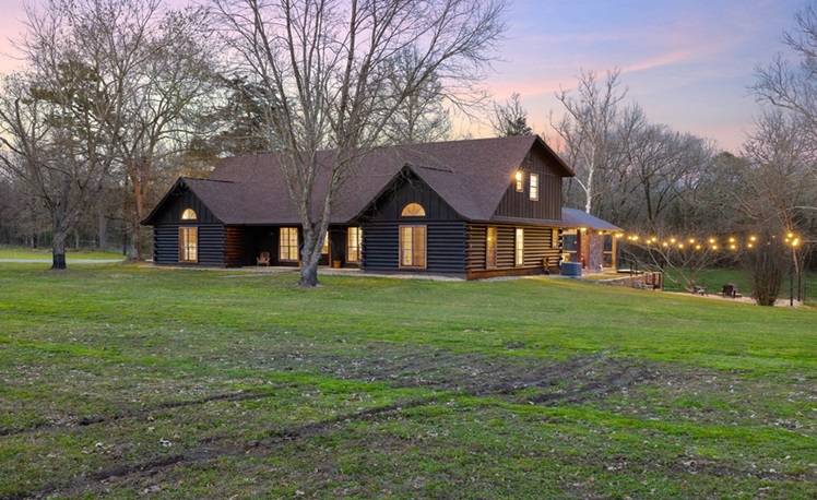 front view with firepit and string lights