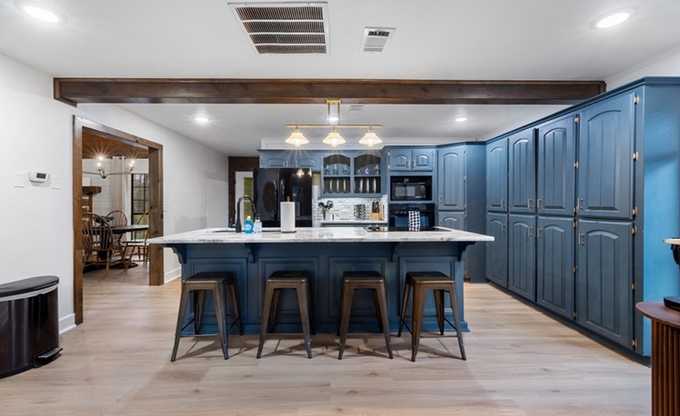 Kitchen and Island leading to dining area