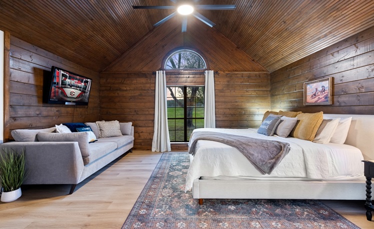 Master-Bedroom-1-with-Couch-and-TV