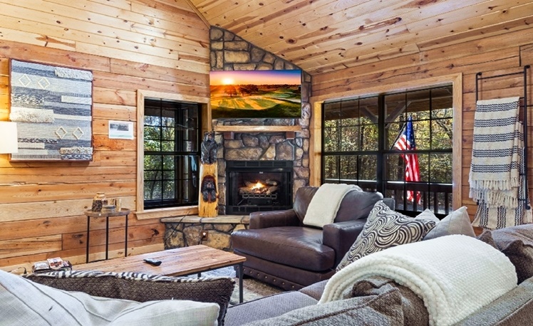 great room with fireplace and seating