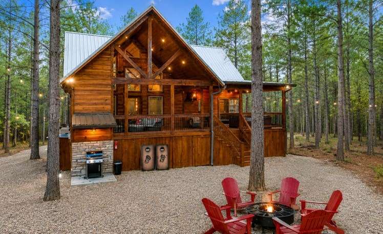 View of Fire Pit and Grill in backyard of just chillin cabin