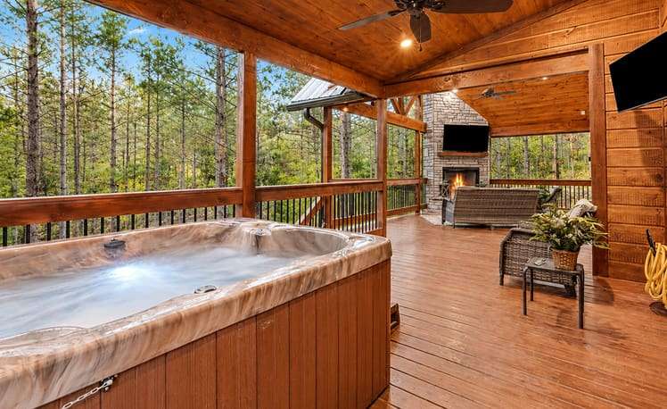 Hot tub on back deck of just chillin cabin