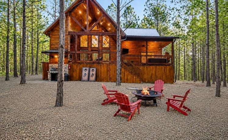 Photo of fire pit behind just chillin cabin
