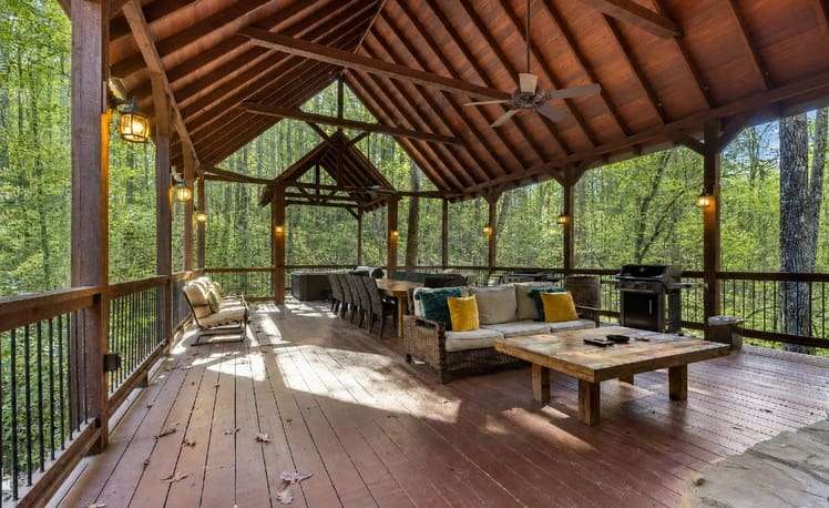 large back deck with table